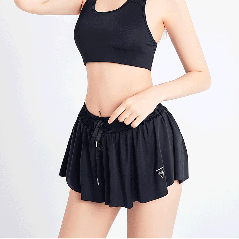 2-in-1 tennisshorts dam — sportshorts med innershorts