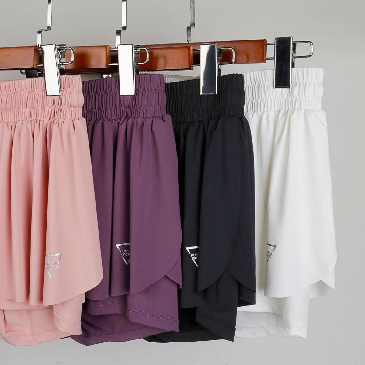 2-in-1 tennisshorts dam — sportshorts med innershorts