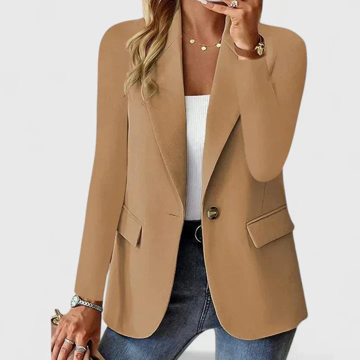 Blazer dam — elegant kavaj i linne med revers, en knapp och fickor