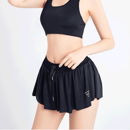 2-in-1 tennisshorts dam — sportshorts med innershorts