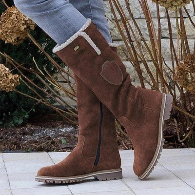 Vinterboots dam, textil — varma och stilrena med halkfri såla