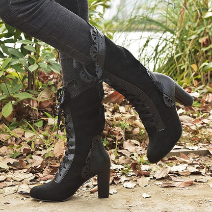 Högklackade boots dam i läderimitation — eleganta stövletter med hög klack