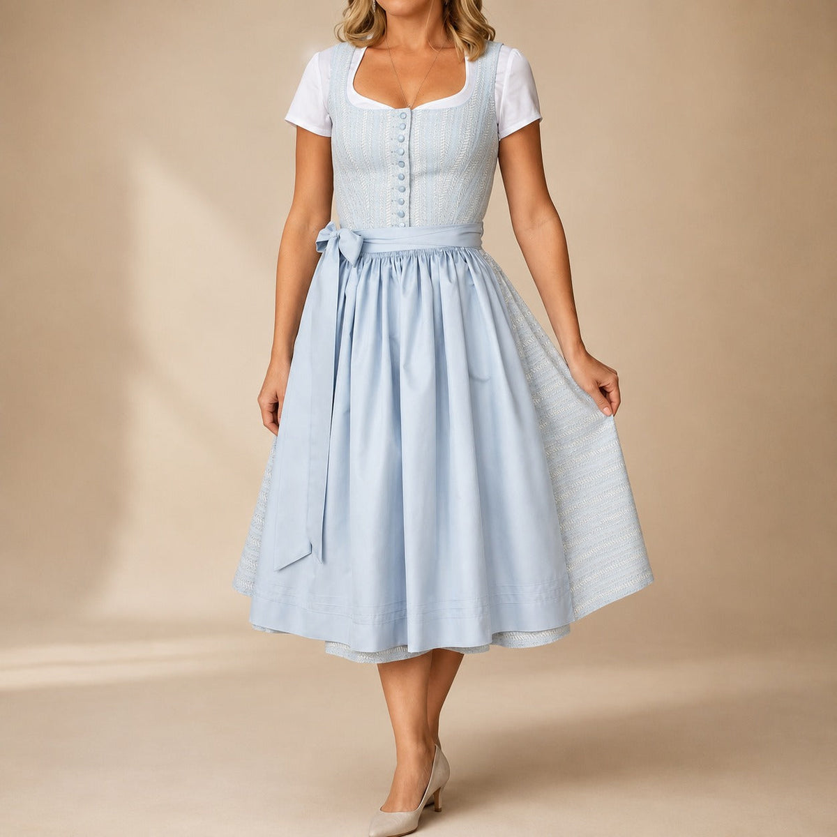 Dirndl dam med rosett — klassisk Oktoberfest-klänning
