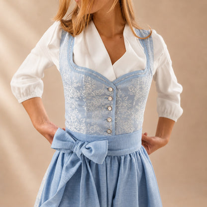 Dirndl dam med rosett — klassisk Oktoberfest-klänning