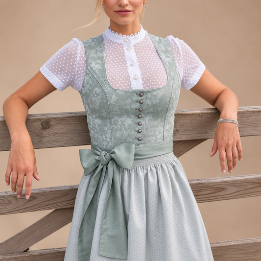 Dirndl dam med rosett — klassisk Oktoberfest-klänning
