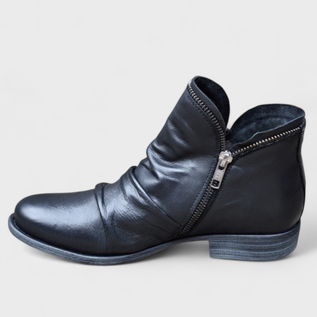Ankelboots dam — i läderimitation med dämpad insula, stilrena