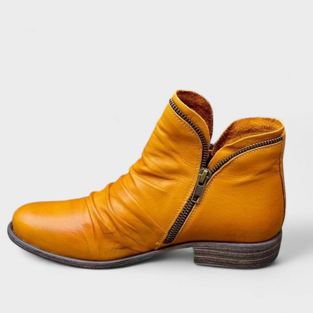 Ankelboots dam — i läderimitation med dämpad insula, stilrena