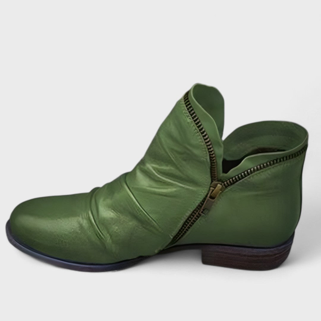 Ankelboots dam — i läderimitation med dämpad insula, stilrena
