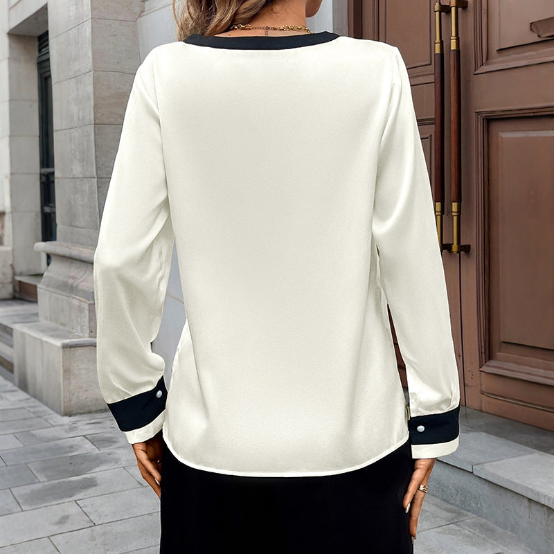 Blus dam i sidenlook — med v-ringning och pärlemorknappar