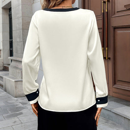 Blus dam i sidenlook — med v-ringning och pärlemorknappar