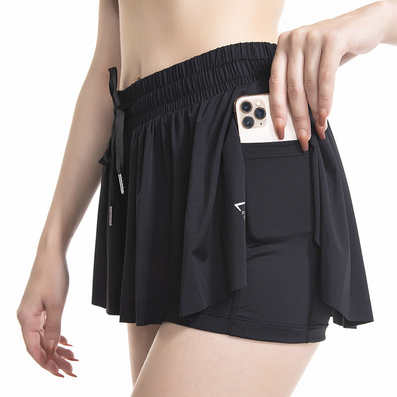 2-in-1 tennisshorts dam — sportshorts med innershorts