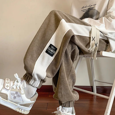 Joggingbyxor herr — streetwear mjukisbyxor med patchdesign