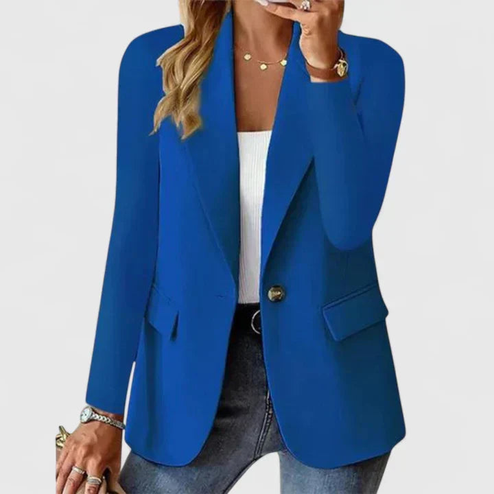 Blazer dam — elegant kavaj i linne med revers, en knapp och fickor