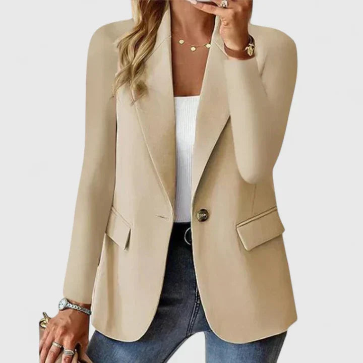 Blazer dam — elegant kavaj i linne med revers, en knapp och fickor