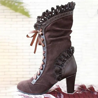 Högklackade boots dam i läderimitation — eleganta stövletter med hög klack