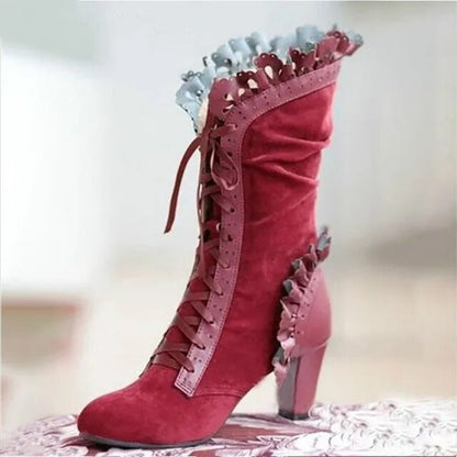 Högklackade boots dam i läderimitation — eleganta stövletter med hög klack