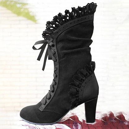 Högklackade boots dam i läderimitation — eleganta stövletter med hög klack